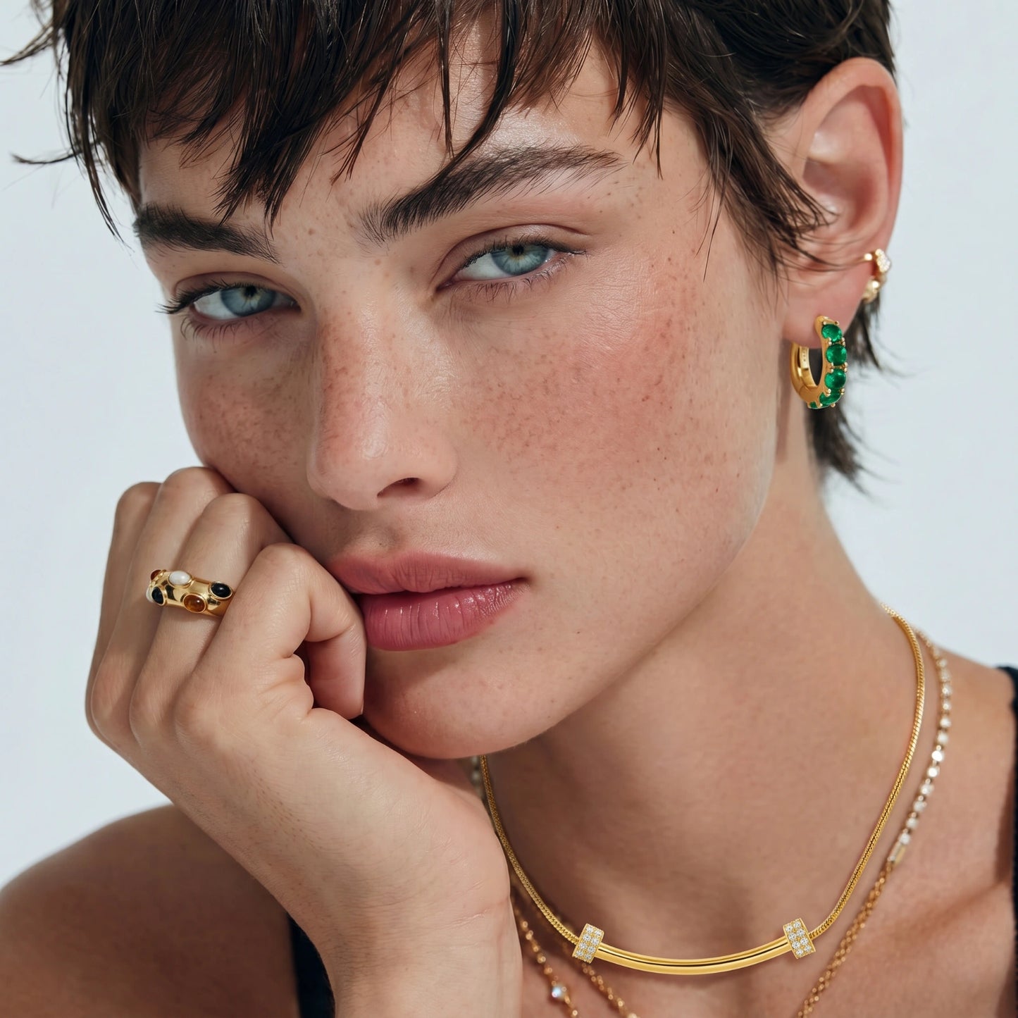 Emerald Huggie Hoops by Luné